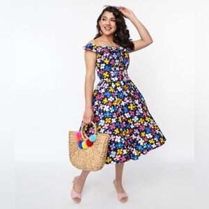 IN SEARCH OF… Unique Vintage Magnolia Place Navy & Multicolor Floral Swing Dress